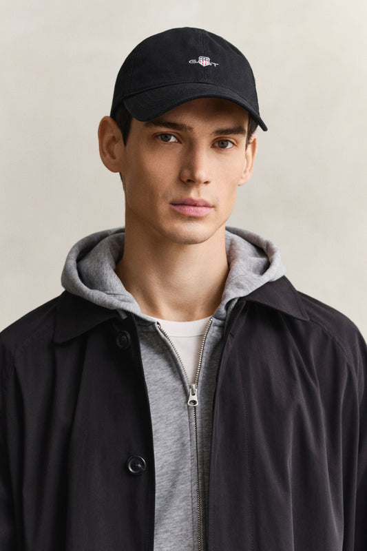 GANT Shield Cotton Twill Cap – Black – on model, front view